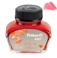 Szklany flakonik atramentu Pelikan 4001 Brilliant Red 30 ml z czarną zakrętką i próbką jasnoczerwonego koloru.