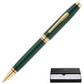 Długopis Cross Coventry w kolorze ciemnozielonym ze złotą skuwką i klipem, prezentowany obok czarnego pudełka