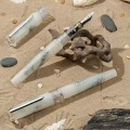 pioro-wieczne-benu-euphoria-white-beach-zblizenie-na-stalowke